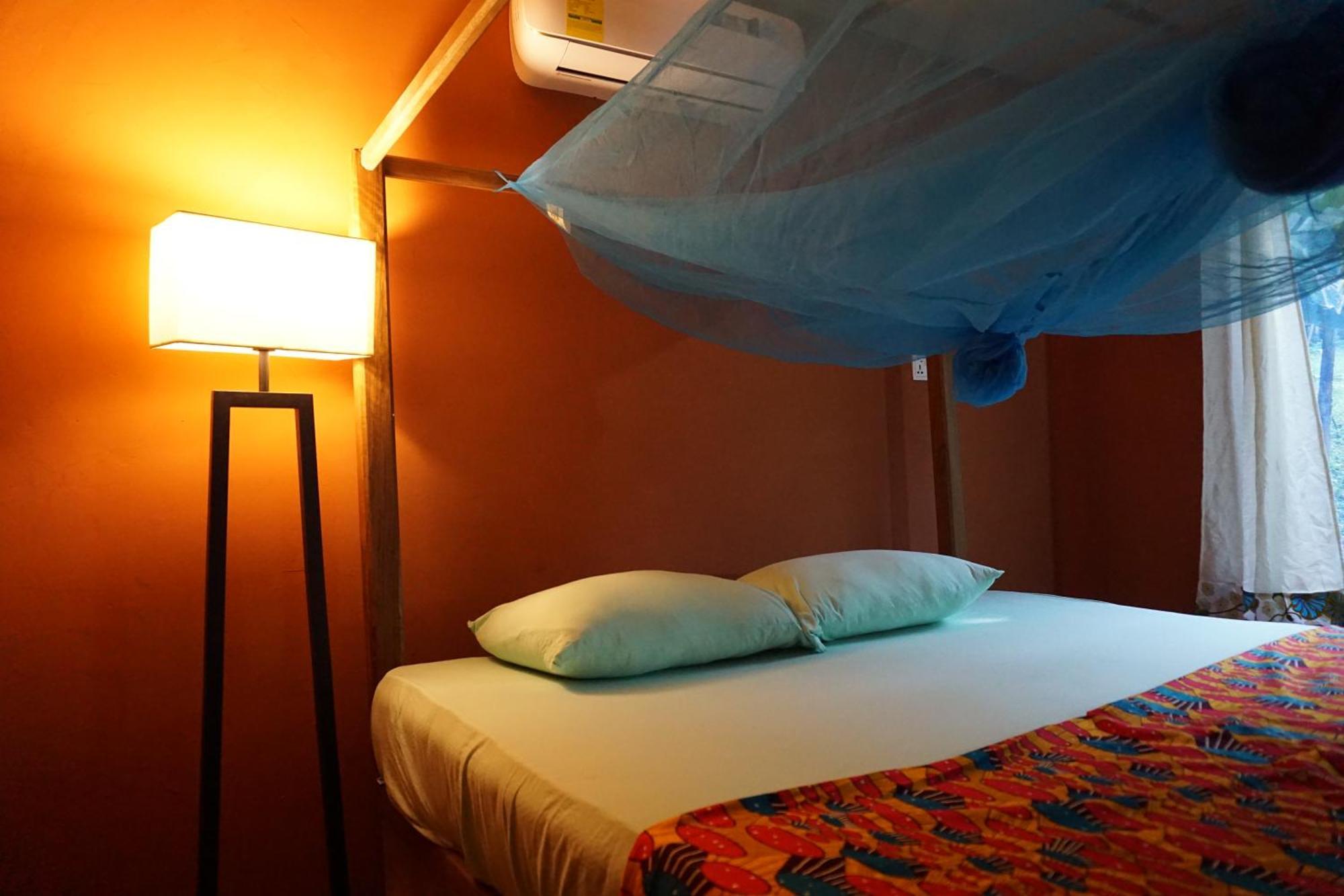 Cocoa Village Guesthouse Obo  ภายนอก รูปภาพ