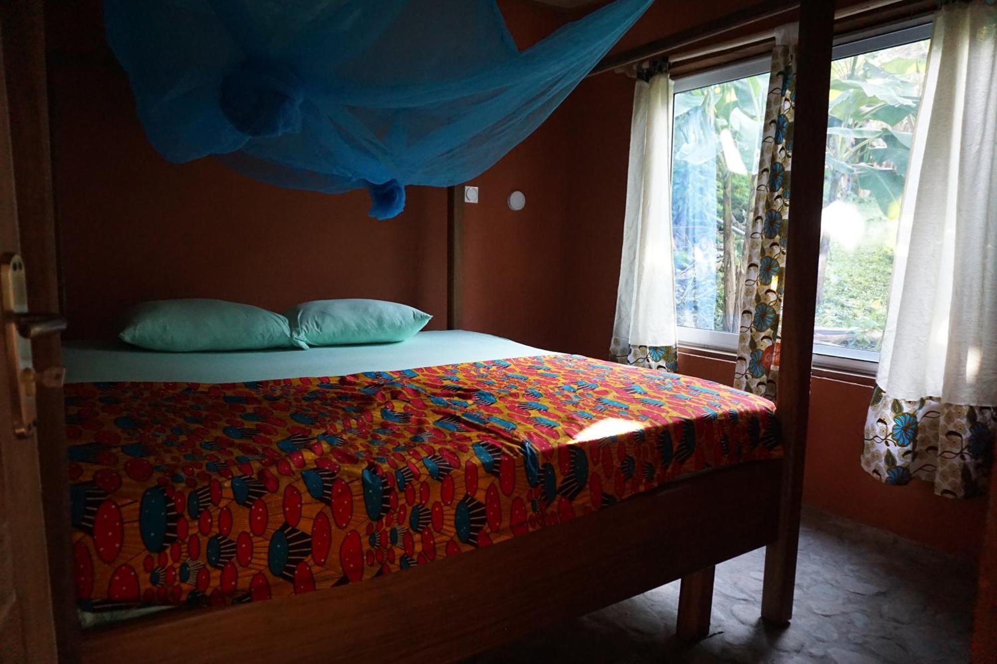 Cocoa Village Guesthouse Obo  ภายนอก รูปภาพ